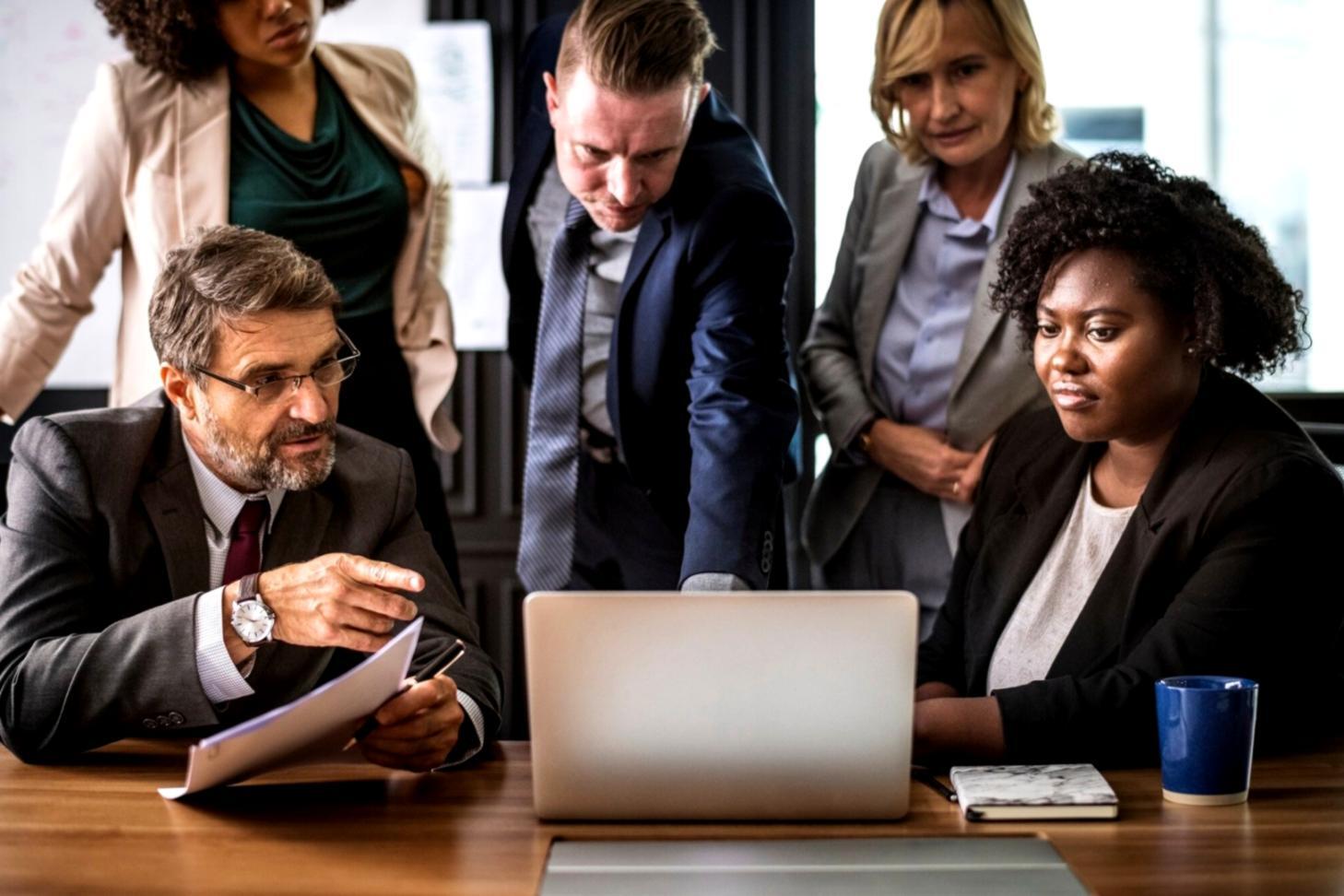 Business advisor consulting with franchise owner about growth strategies